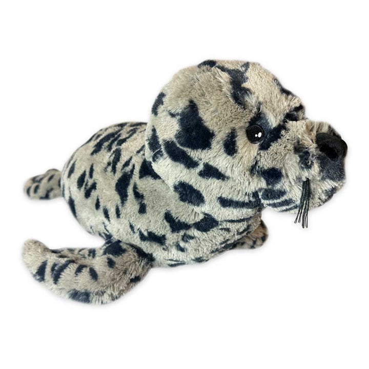 Earth Pal Harbor Seal Plush features gray fur with black spots, black eyes and nose, short whiskers, and lies on its belly against a white background—crafted from recycled materials for an eco-friendly touch.