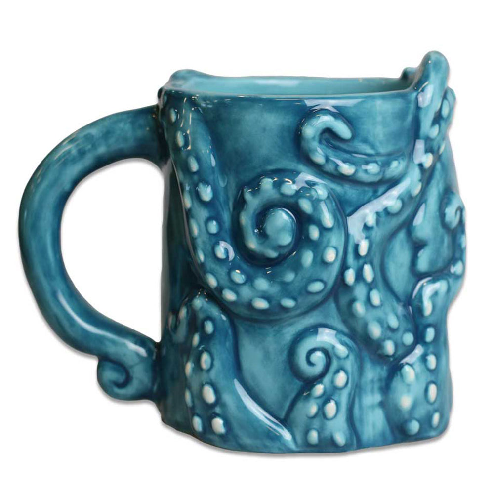 The Octopus 3D Mug is a blue ceramic mug with sculpted tentacles, white suction cup details, and a glossy finish—an ideal aquarium-themed gift for ocean lovers.