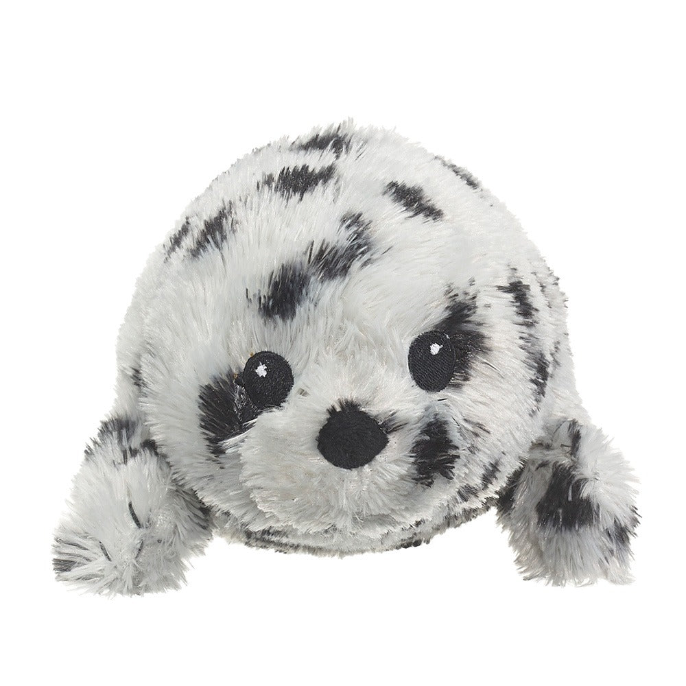 The Eco Pals Harbor Seal Pup Plush is a round, gray, black-spotted stuffed toy with flippers, made from recycled plastic. It has soft, fluffy fur and is safe for newborns.