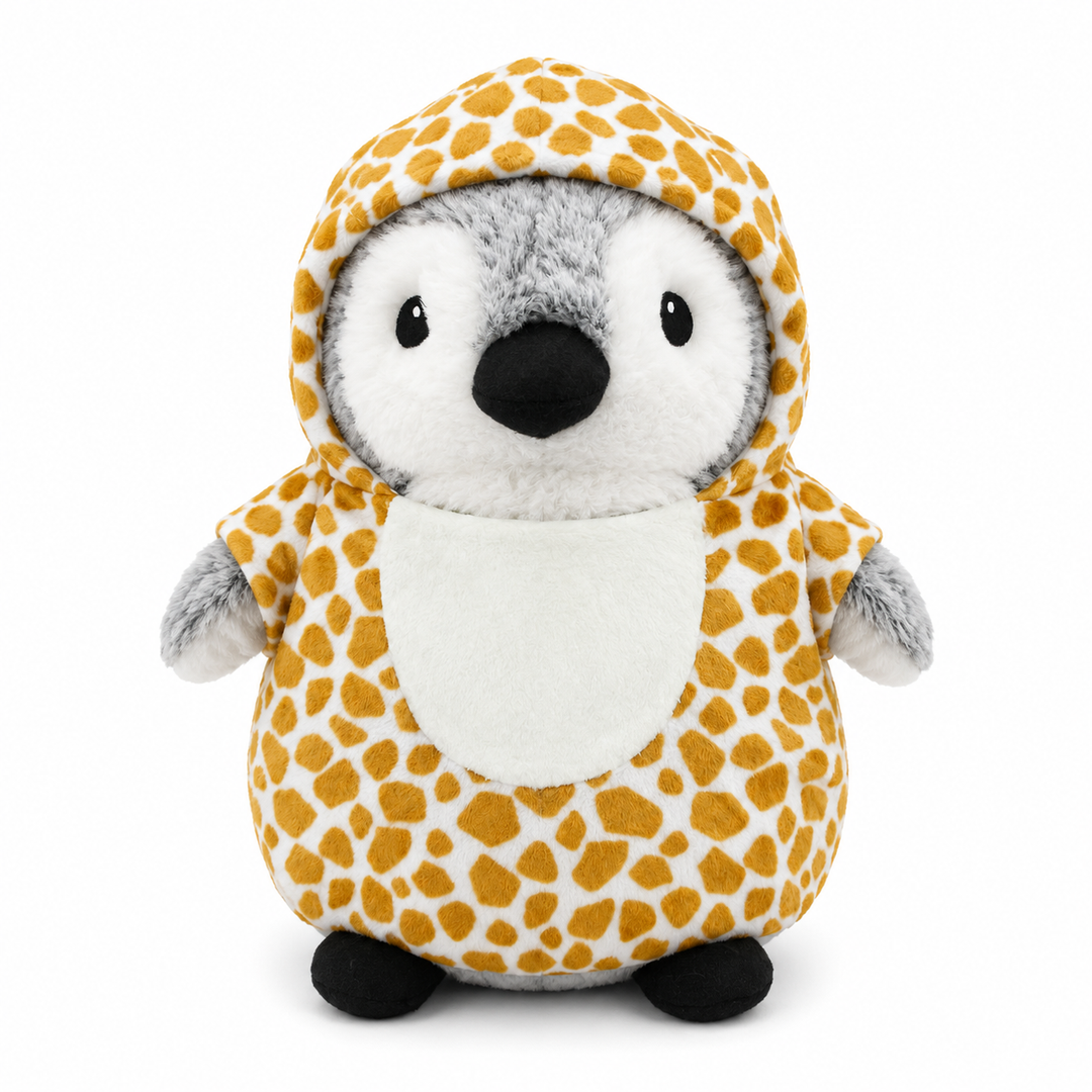 A plush penguin toy with a gray face and flippers, made from sustainable materials, wears the Plushy’s Closet Sea Turtle Costume as it sits against a plain white background.