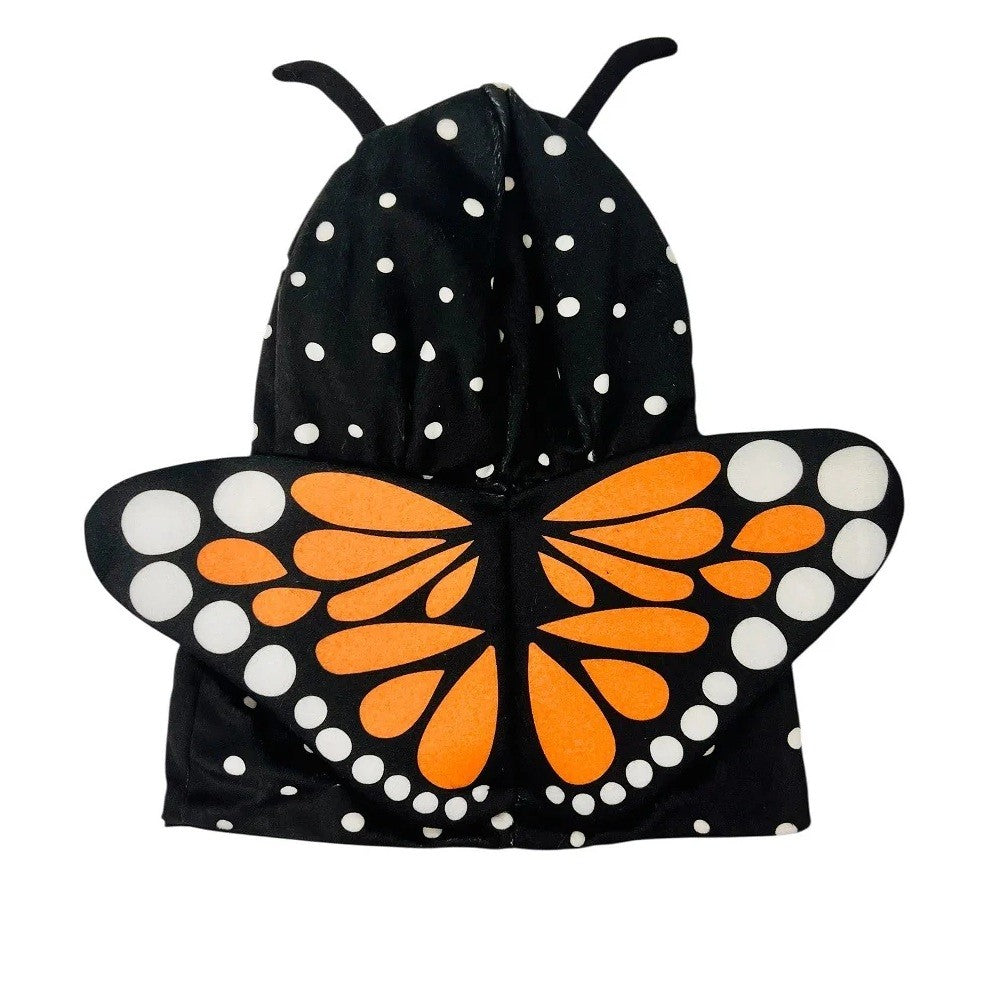 Introducing the Plushy’s Closet Butterfly Outfit: a delightful black hooded cape adorned with white polka dots, orange and white butterfly wings, and two black antennae on top—it sparks imagination and transforms any child into a whimsical plush animal.