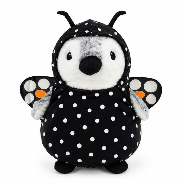 Wearing Plushy’s Closet Butterfly Outfit and fueled by imagination, a plush penguin stands ready for whimsical adventures—dressed in a vibrant butterfly costume with wings, antennae, and colorful accents—all set against a white background.
