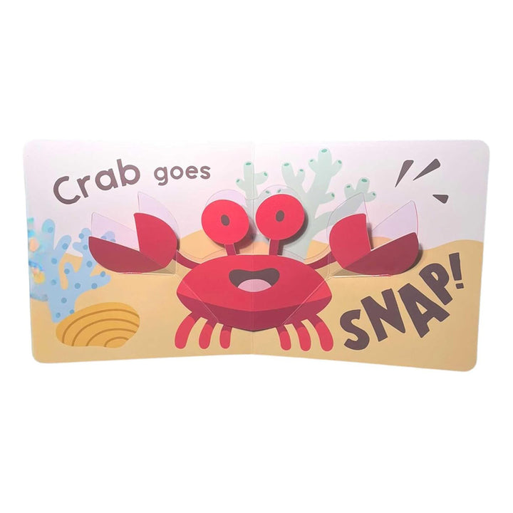 The Mini Pops: In the Sea! mini pop-up board book features a page with a red crab raising its claws and big eyes, with the text "Crab goes SNAP!" and underwater illustrations, perfect for babies and toddlers.