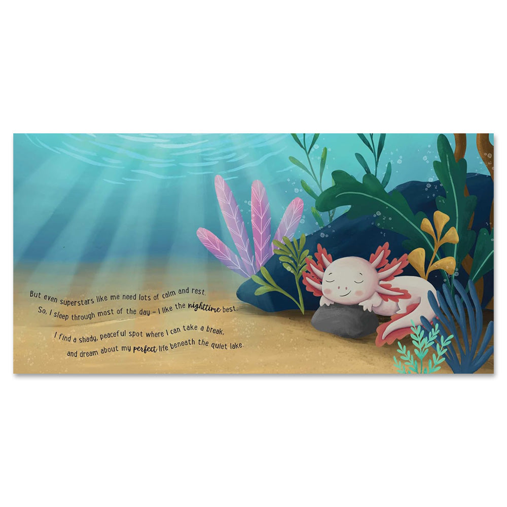 An illustrated underwater scene from "I Love Being an Axolotl: Padded Board Book: Picture Storybook" shows an axolotl resting on a rock among colorful plants and sunlight, perfect for teaching children about calm and peaceful moments.