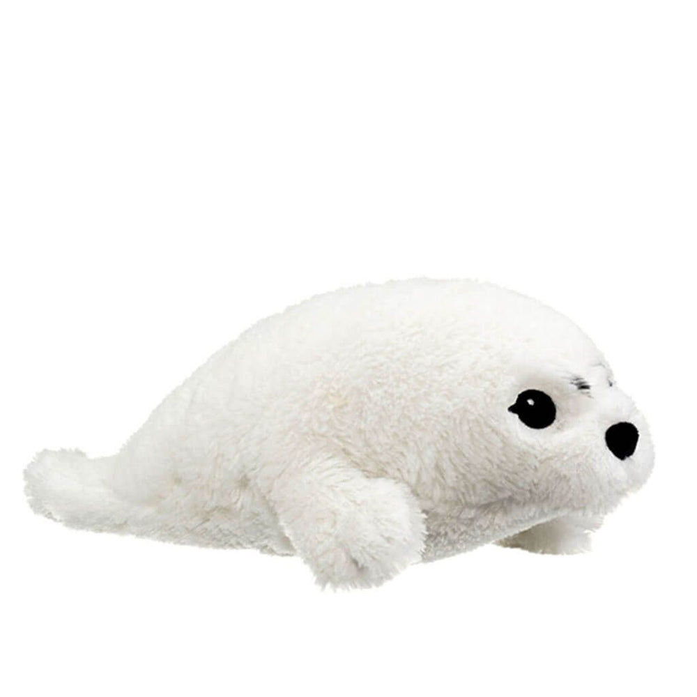 The Eco Pals Harp Seal Pup Plush is an eco-friendly stuffed animal shaped like a white seal with black eyes and nose, lying flat. Crafted from recycled materials, it’s perfect for cuddling and caring for the environment.