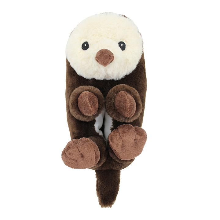 Sea Otter Plush Slippers feature a white-faced, dark brown otter with a light brown nose and paws, lying on its back with paws up—perfect for marine animal fans.